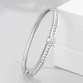 Timeless Sparkle: Elegant Sterling Silver Bangle with Central Stone